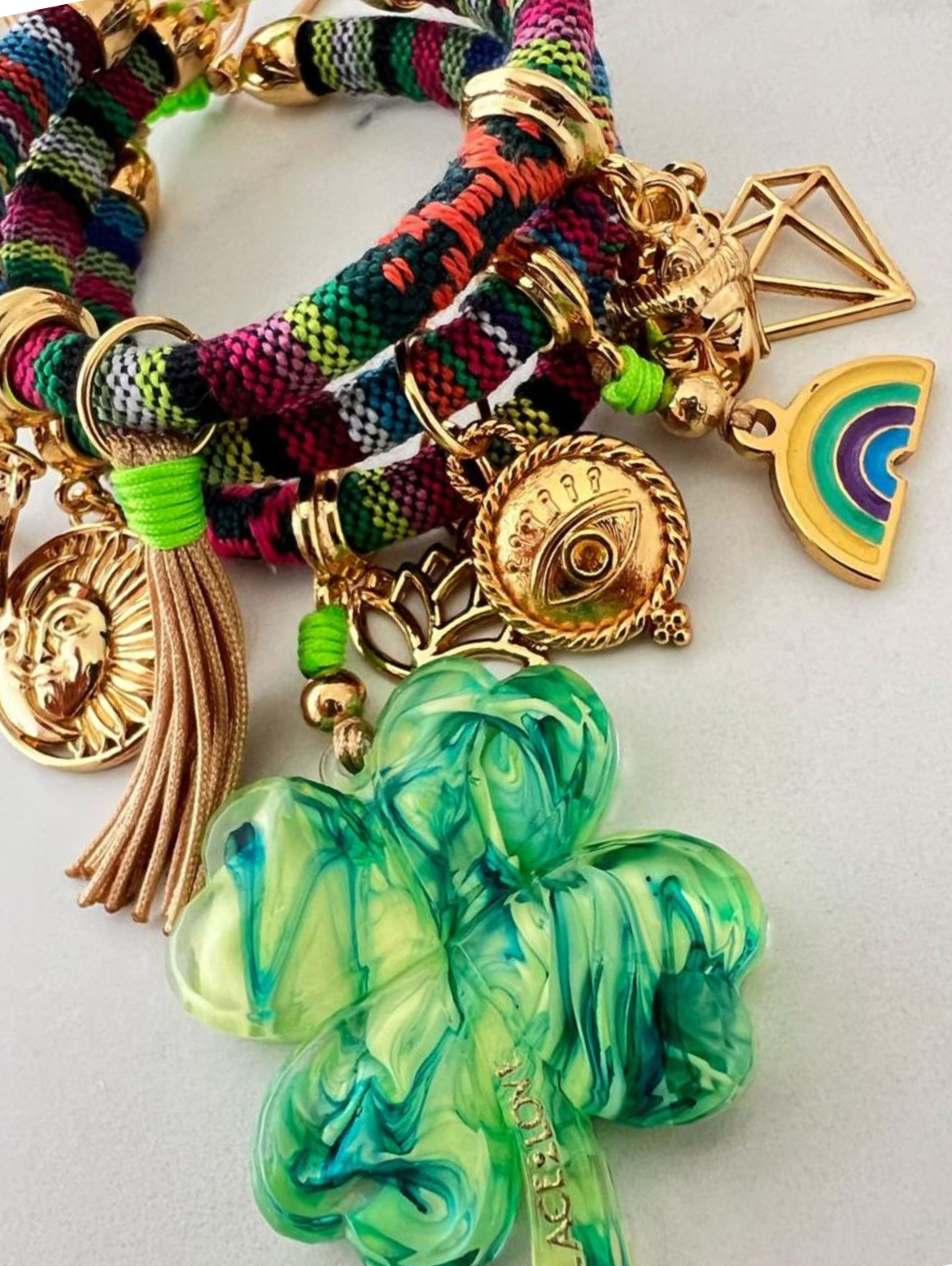 Bohemian Multicoloured Bracelet with Neon Green Clover Charm and Gold-Tone Charms