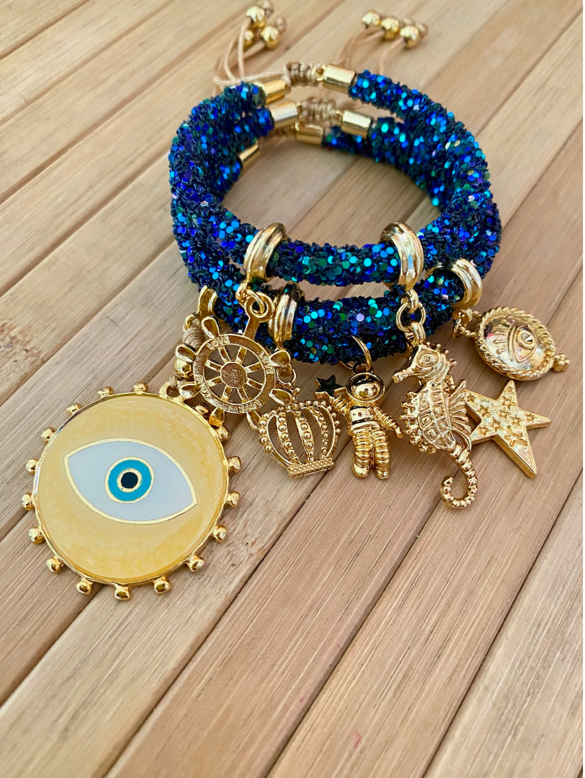 Pulsera de diamantes de imitación azul oscuro con ojo malvado, dijes dorados y cuentas azules