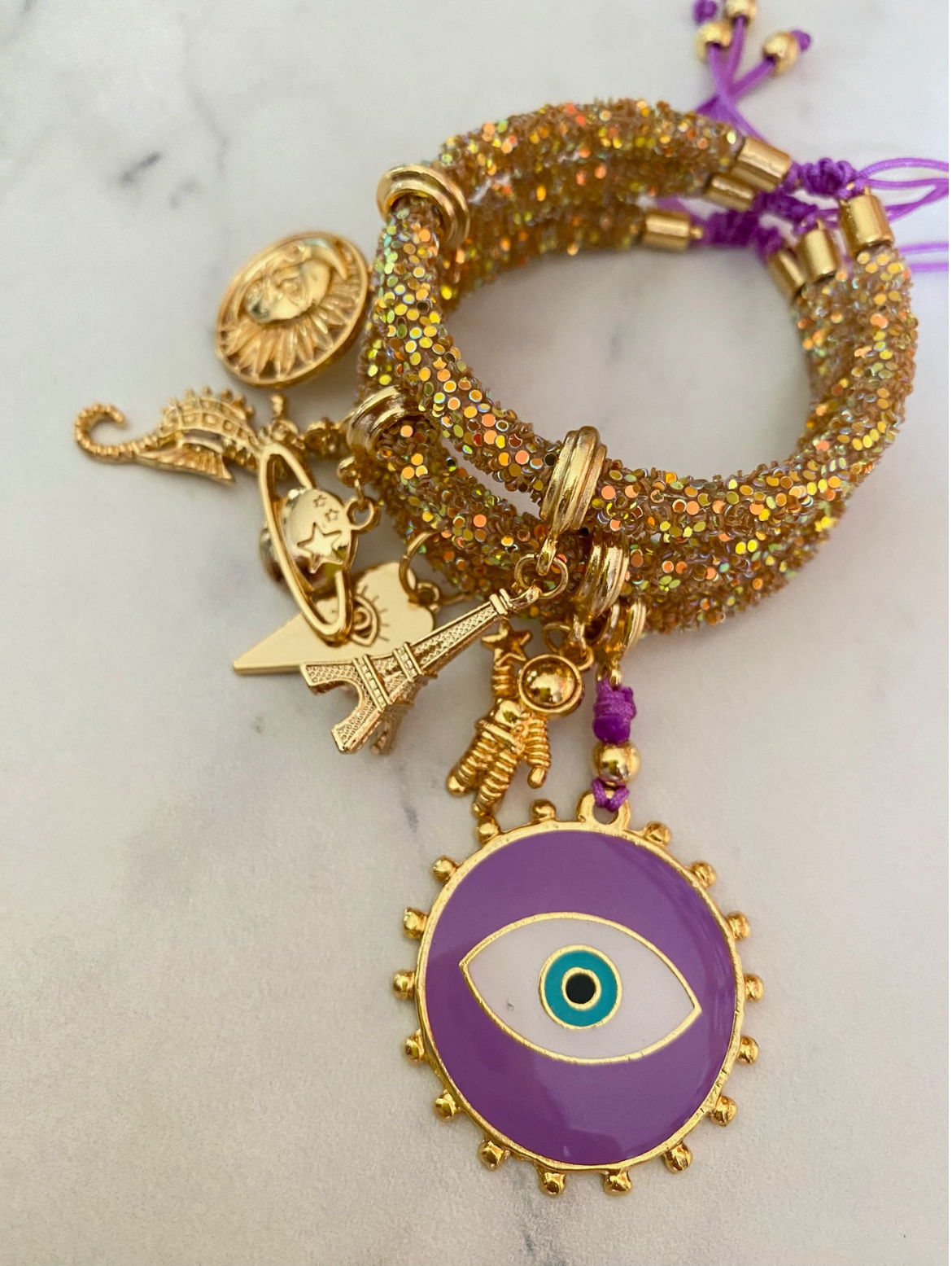 Golden Rhinestones Bracelet Set with Purple Evil Eye and Lucky Charms.