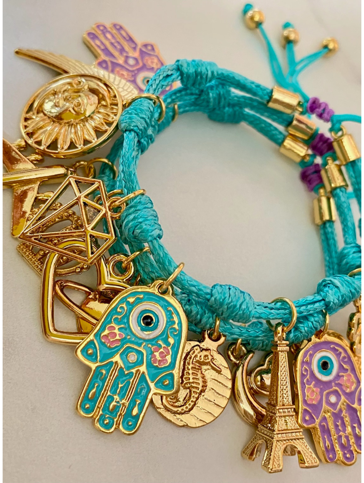 Turquoise Vibora Bracelet with Mini Hamsa Hands and Lucky Charms.