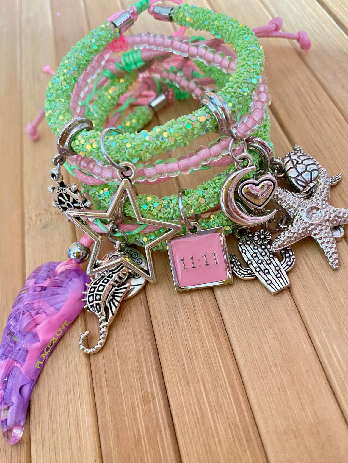 Green Rhinestones Bracelet with Pink Beads, Silver Charms and Purple Win