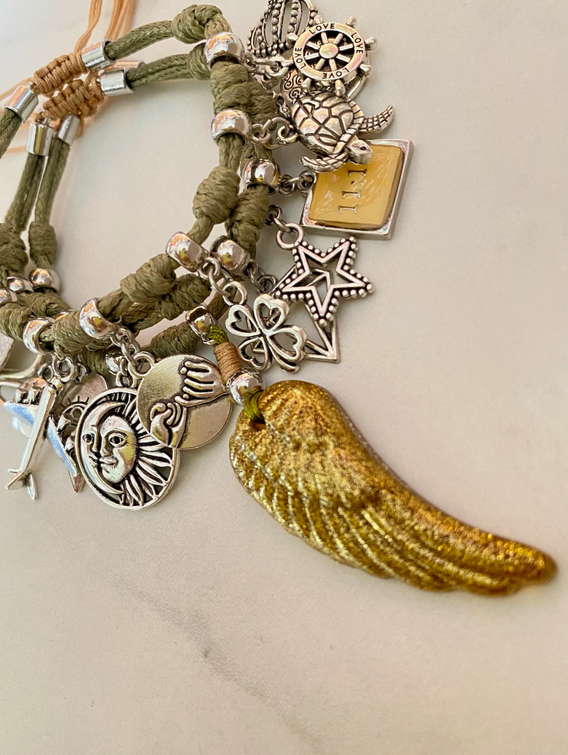 Green Olive Vibora Bracelet with Lucky Wing and Silver Lucky Charms.