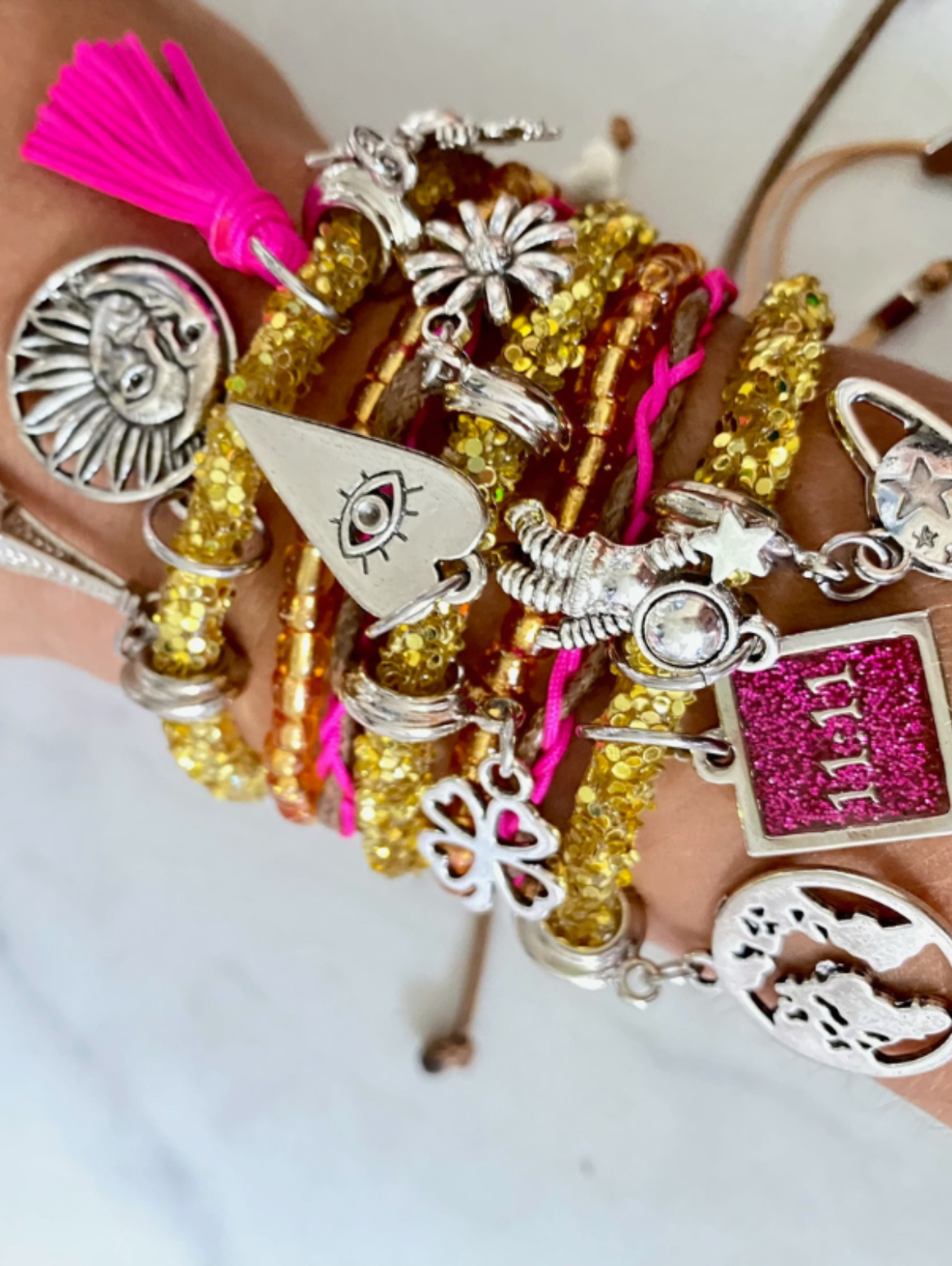 Golden Rhinestone Bracelet with Pink Charm and Silver Accents