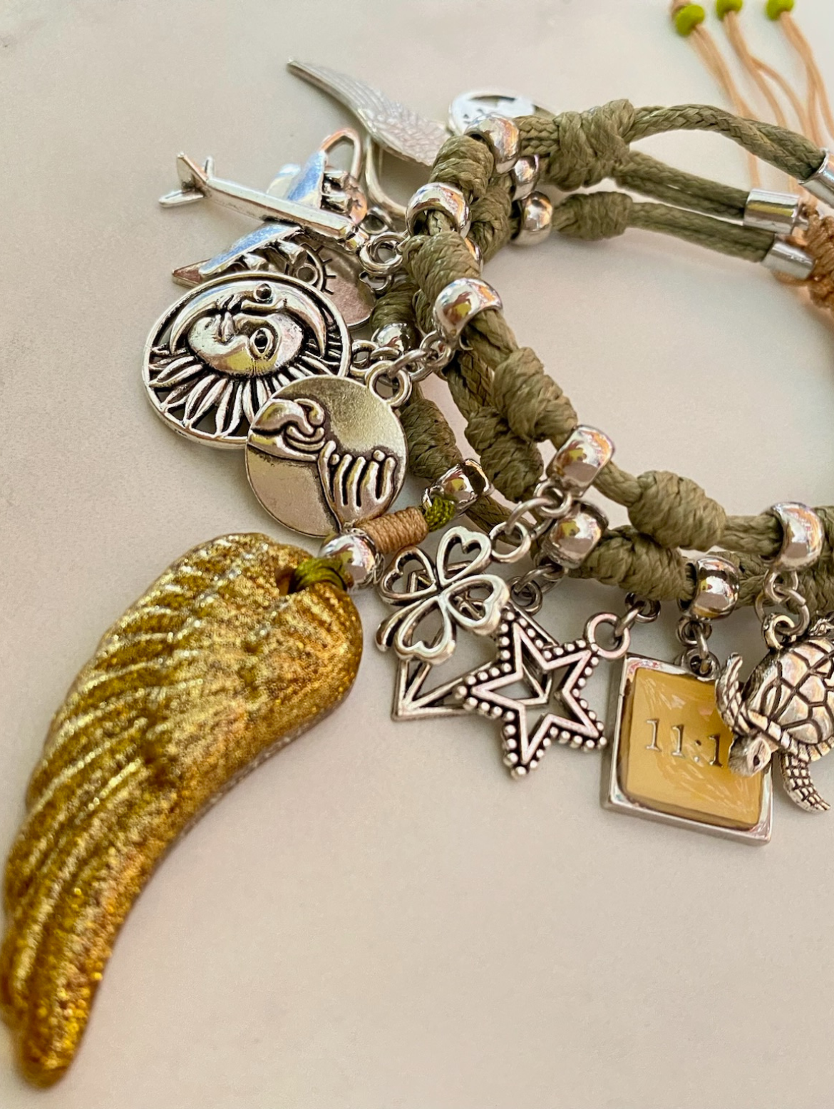 Green Olive Vibora Bracelet with Lucky Wing and Silver Lucky Charms.