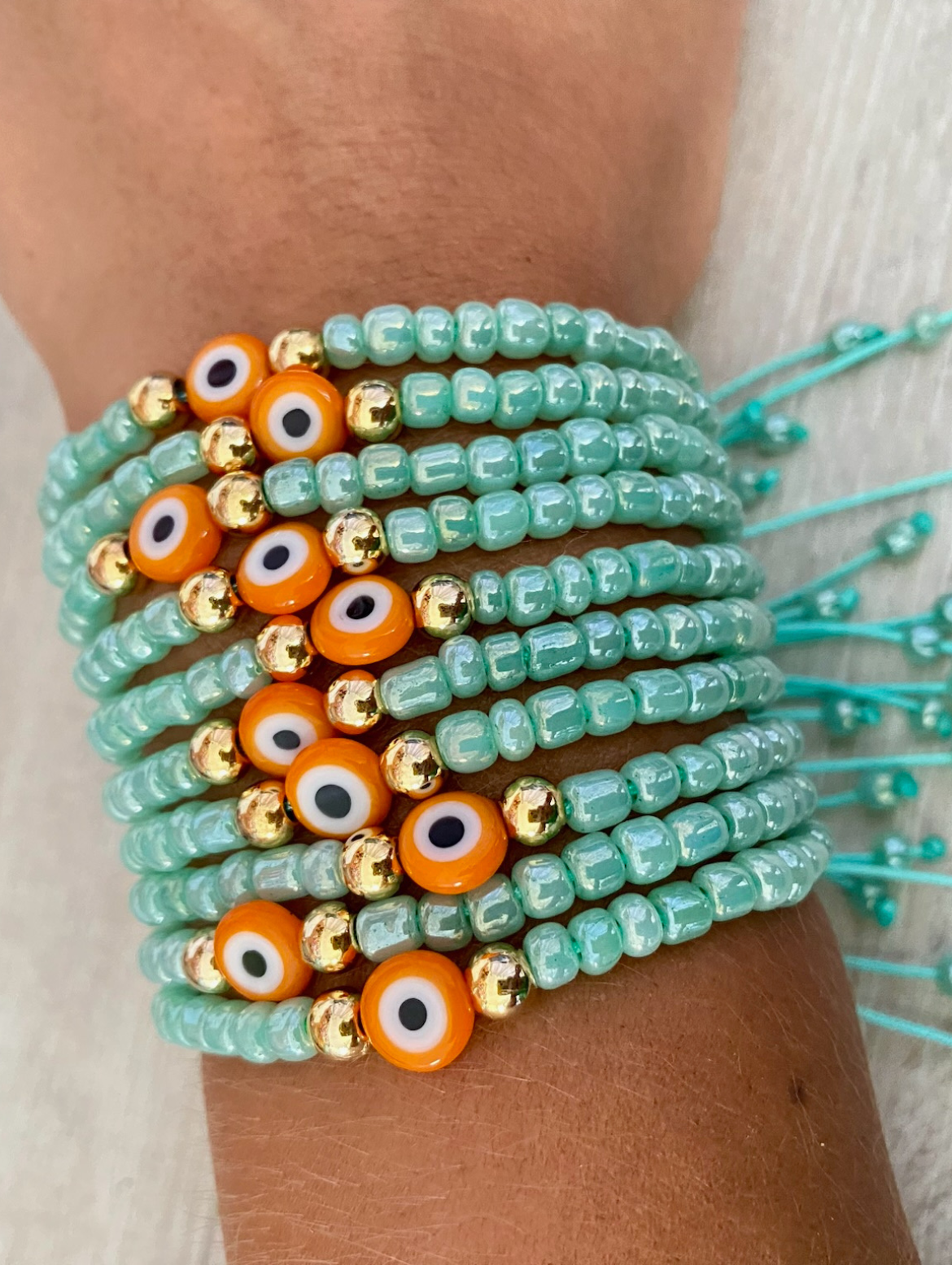 Multi-Strand Mint Green and Orange Evil Eye Beaded Bracelet