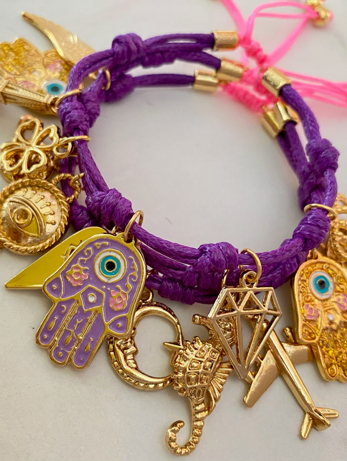 Purple Víbora Cord Bracelet with Mini Hamsa Hand and Lucky Charms