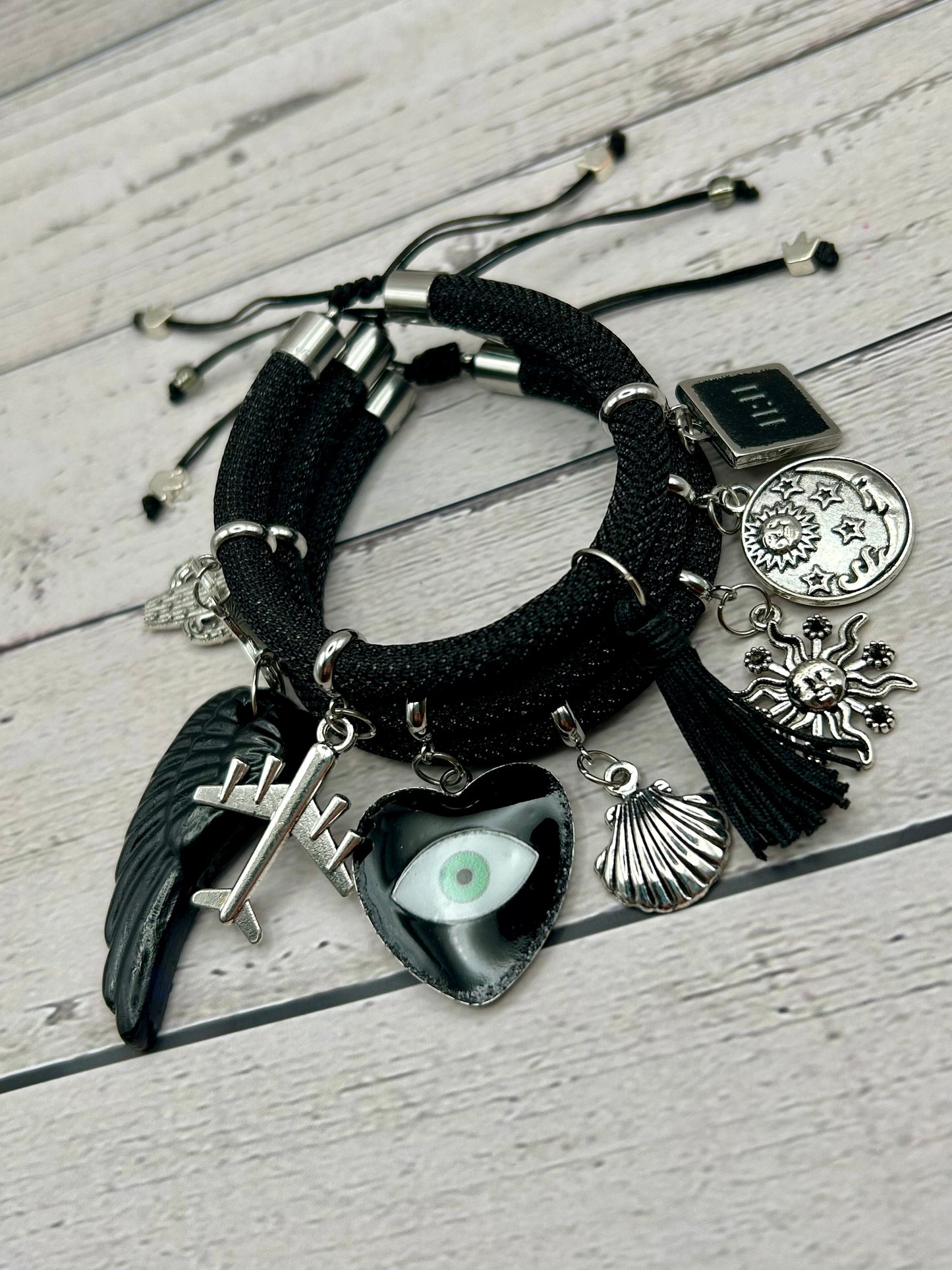 Black Metallic Cord Multi-Charm Adjustable Bracelet – Evil Eye, Travel & Protection Symbols