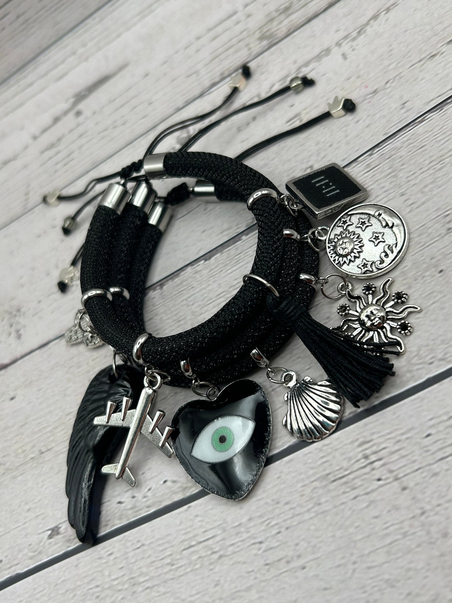 Black Metallic Cord Multi-Charm Adjustable Bracelet – Evil Eye, Travel & Protection Symbols