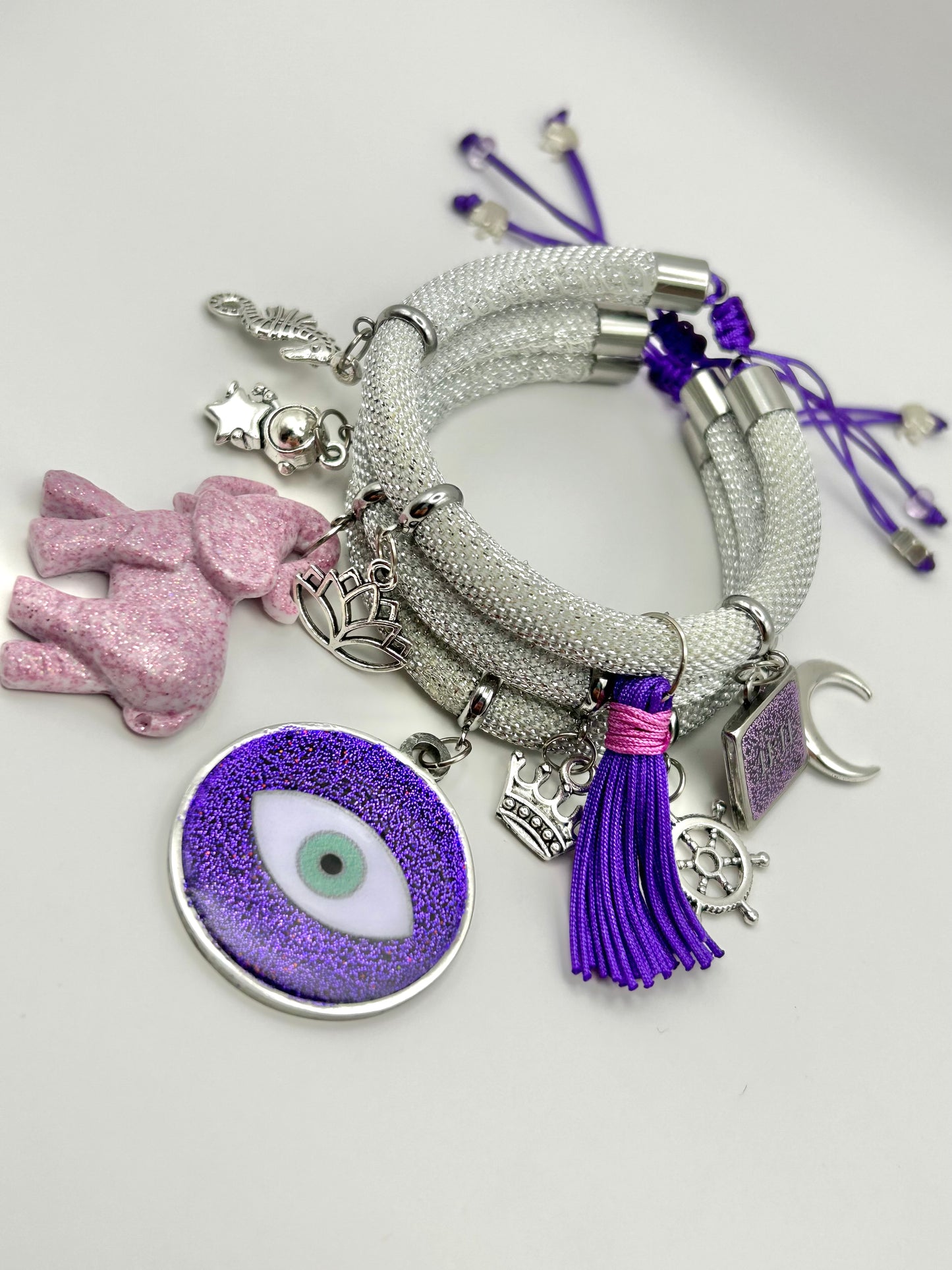 White Metallic Cord Multi-Charm Bracelet – Purple Evil Eye, Elephant & Good-Luck Symbols