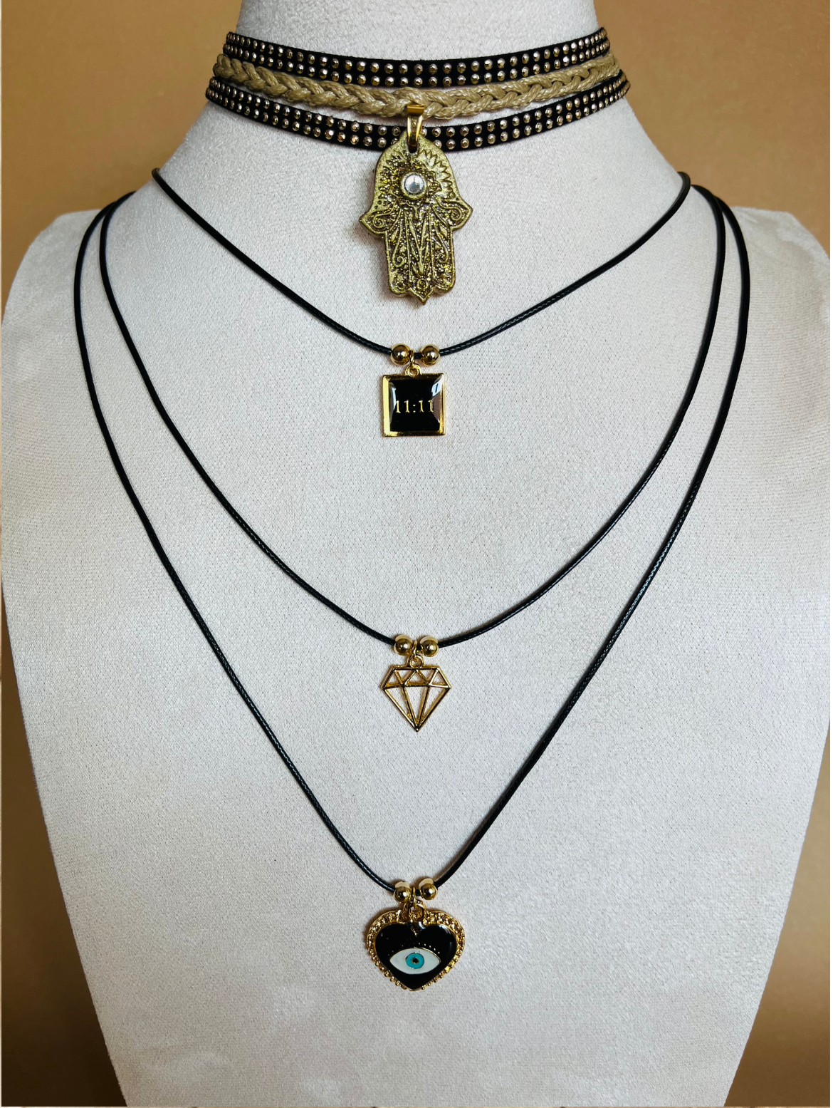 Elegant Layered Choker Necklace Set with Golden Charms and Hamsa Hand